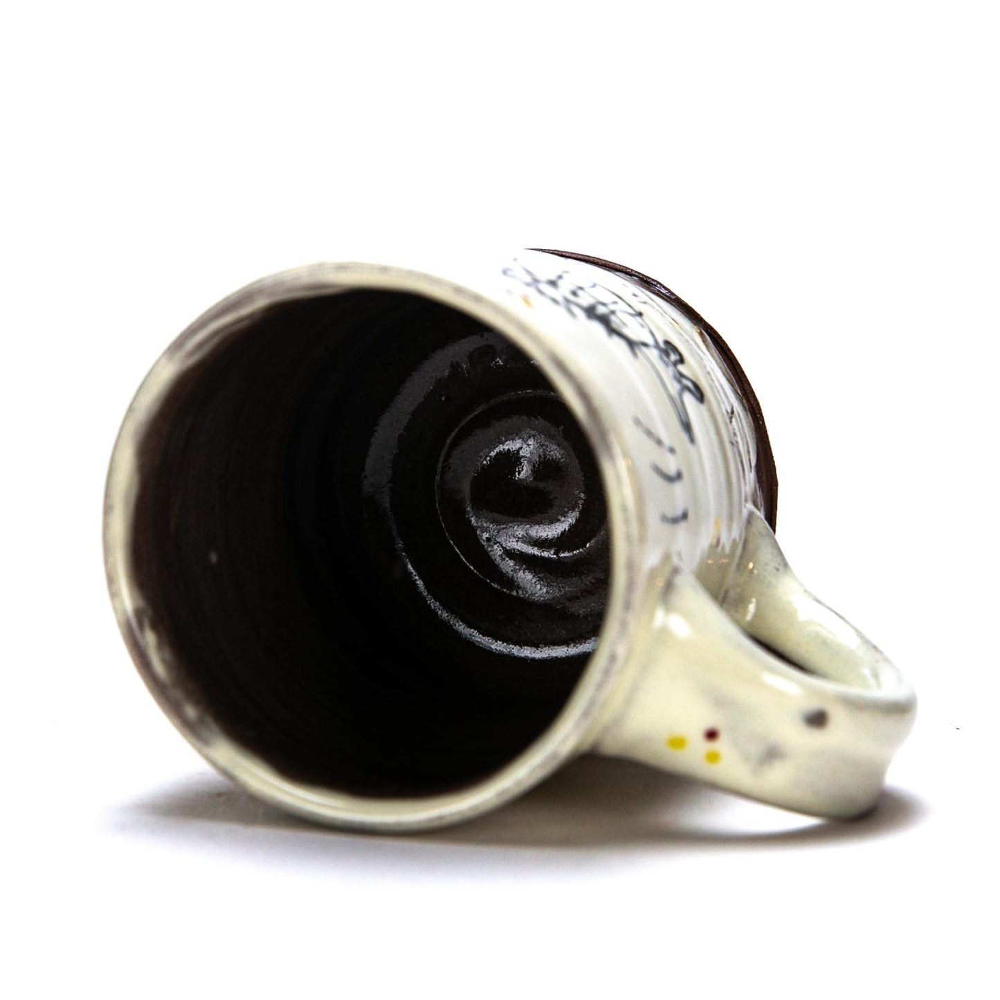 Mug with Dead Armadillo and Hat with Flowers