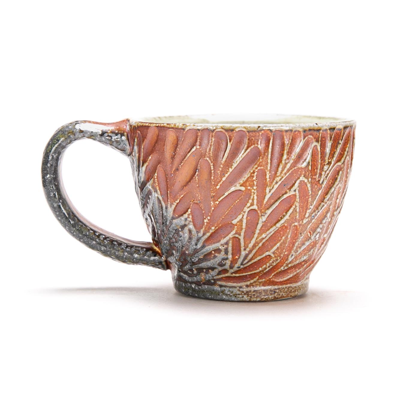 Carved Tea Pot, Cup and Tray Set