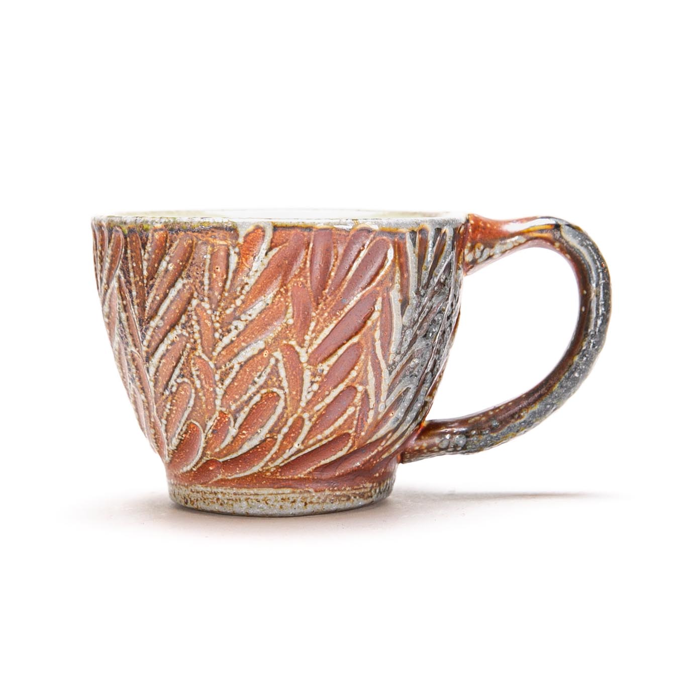 Carved Tea Pot, Cup and Tray Set